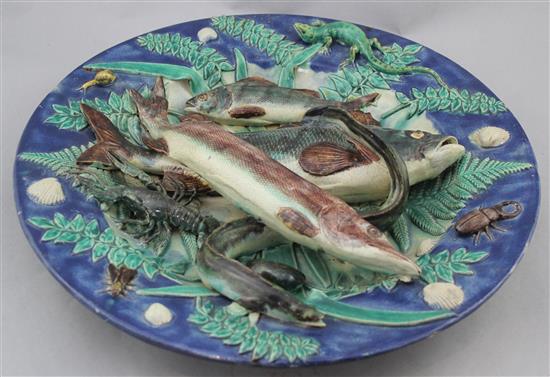 A Palissy style faience dish, late 19th century, 38cm., slight restorations